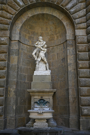 Sculptures inside the Palazzo Pitti courtyard