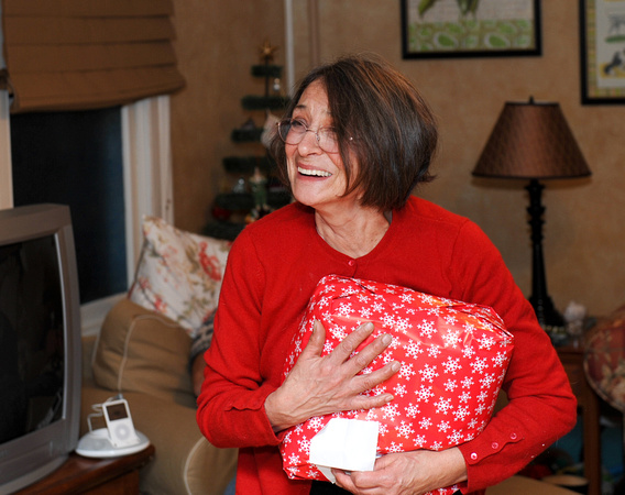 Diane is so happy, she's not even opening her gift